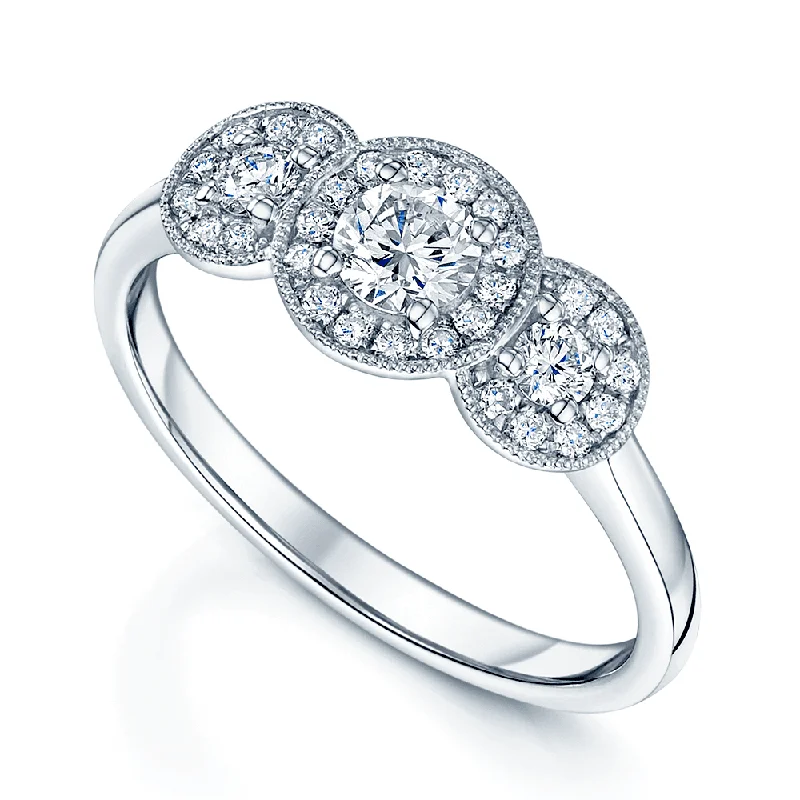 Men's Tanzanite Engagement Rings in Palladium with a Three - Stone ArrangementPlatinum Vintage Style Three Diamond Clusters Ring Men's Tanzanite Engagement Rings in Palladium with a Three - Stone ArrangementPlatinum Vintage Style Three Diamond Clusters Ring