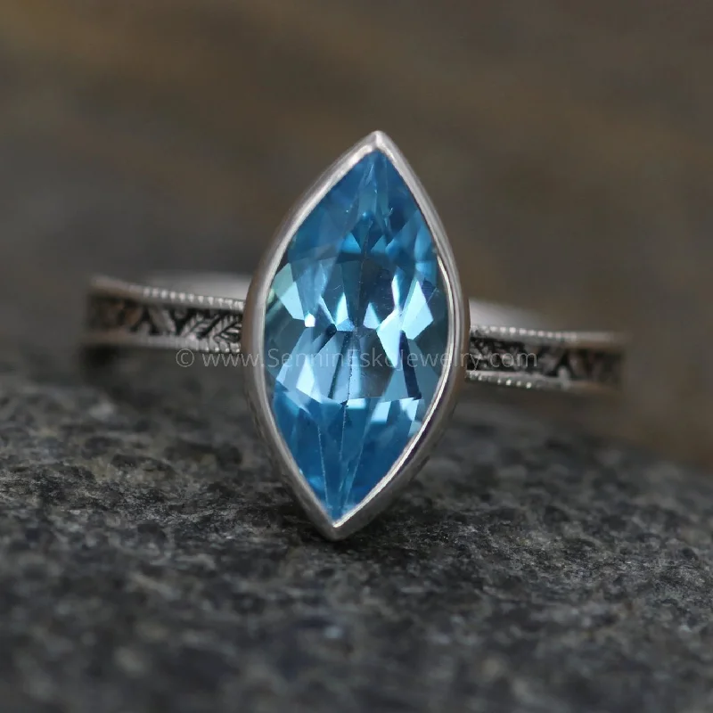 Sapphire Gemstone Rings in 18K White Gold with Diamond Accents for an Elegant EngagementSwiss Blue Topaz Milgrain Leaf Engraved Silver or Gold Multi Bezel Ring - Alternative Engagement Sapphire Gemstone Rings in 18K White Gold with Diamond Accents for an Elegant EngagementSwiss Blue Topaz Milgrain Leaf Engraved Silver or Gold Multi Bezel Ring - Alternative Engagement